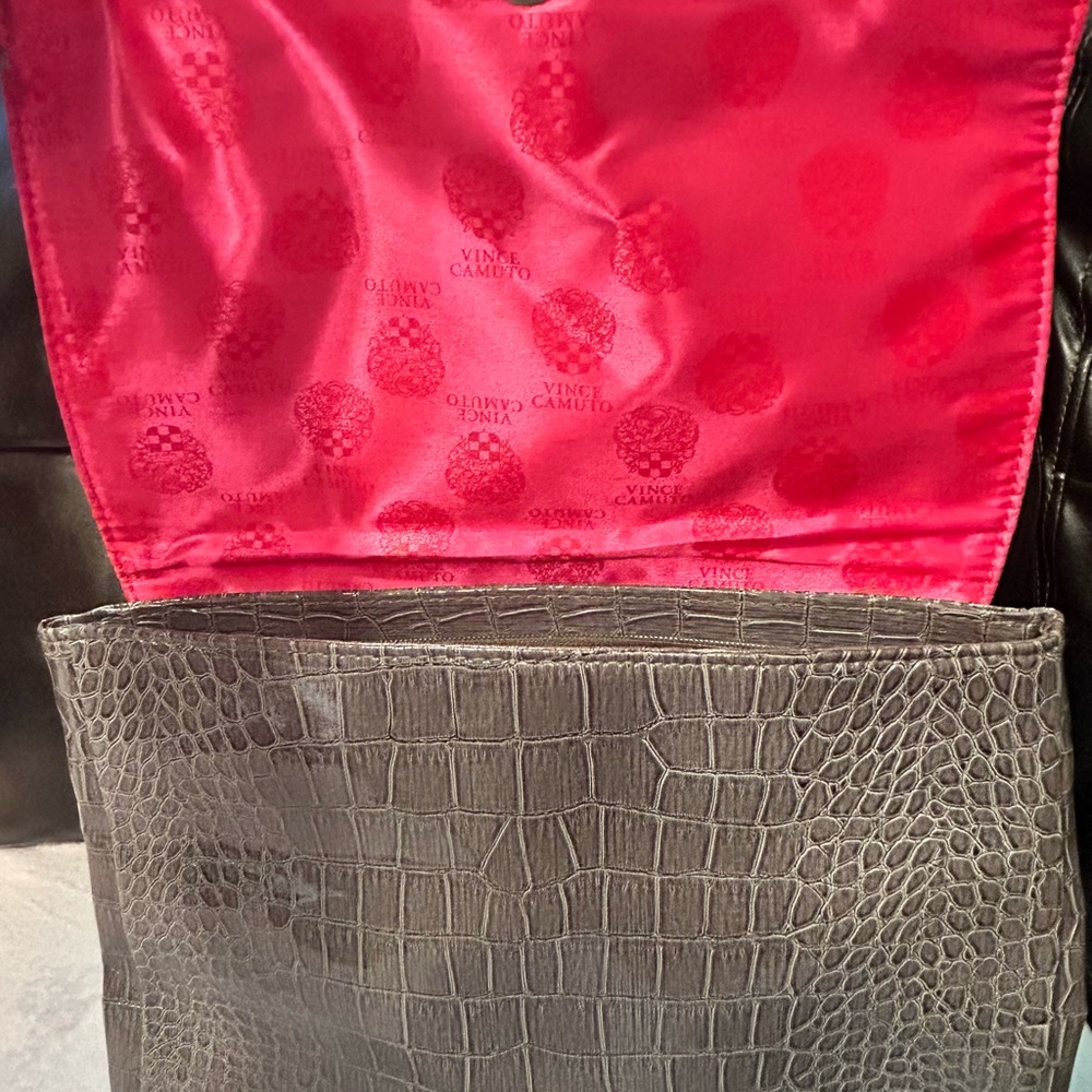 Hola Poshers a Vince Camino medium faux gray snake skin clutch, pink interior.